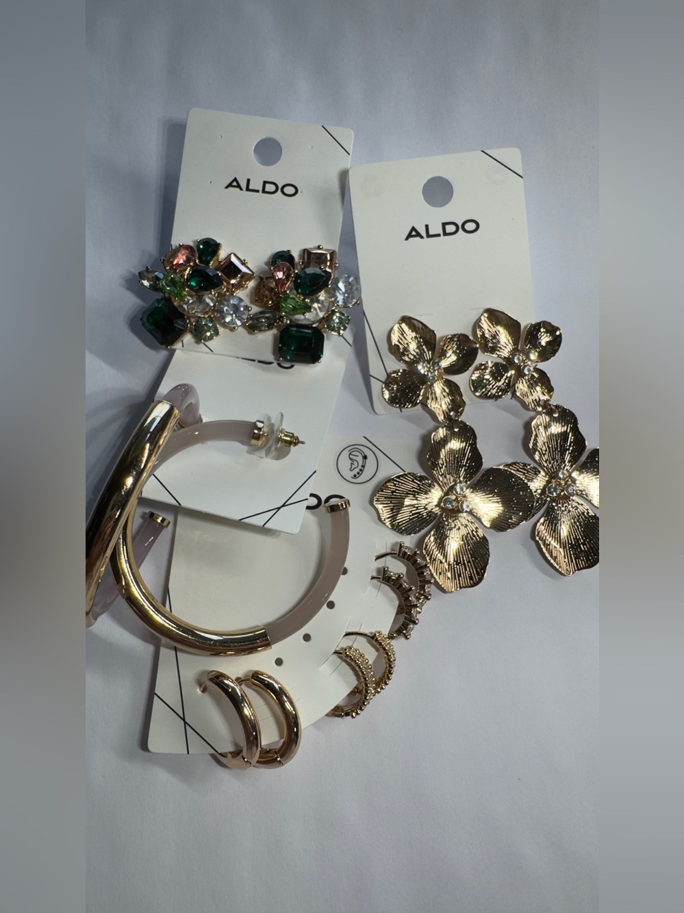 ALDO Gold Floral Drop Earrings with Green & Clear Gem Cluster Studs